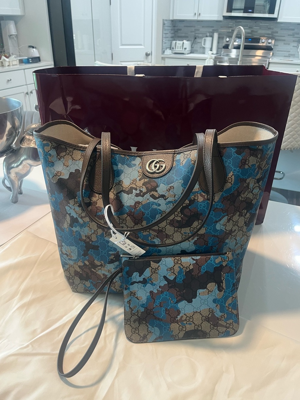 Brand new Gucci Blue and Brown Camo GG Supreme Tote with Wrist Pouch
